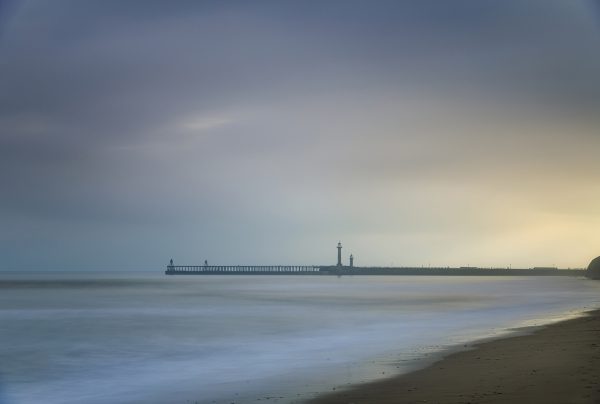Sunrise over Whitby Piers, Whitby Harbour, North Yorkshire
